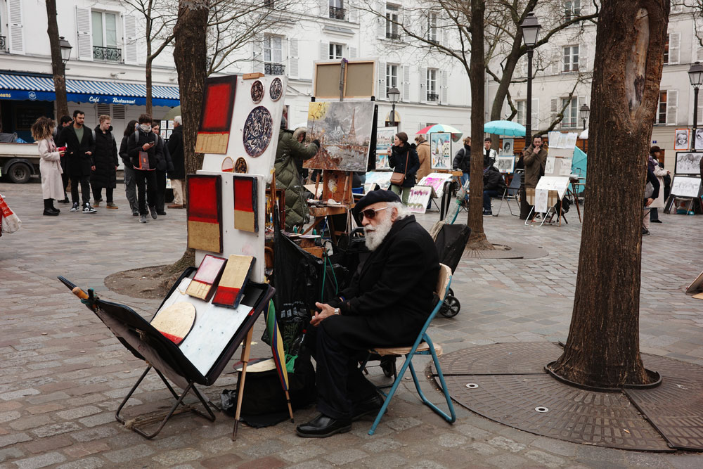 Street artist in the square of Montmartre